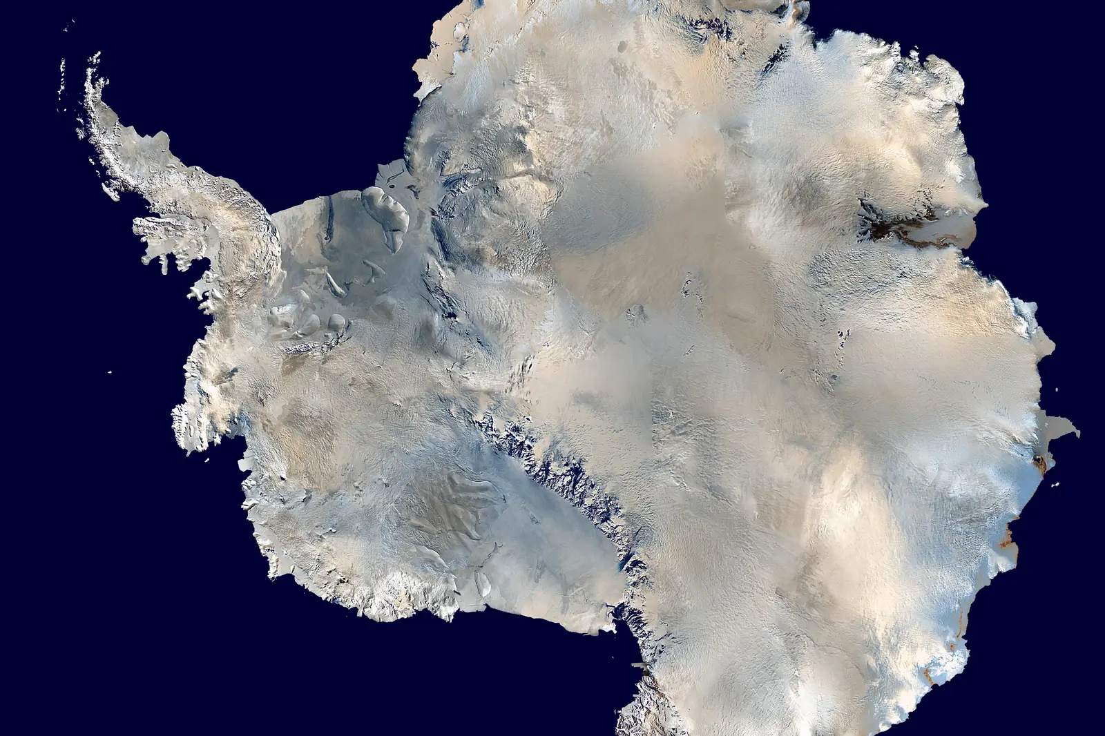 Satellite view of Antarctica showing the ice-covered continent with the Transantarctic Mountains and the Antarctic Peninsula extending toward South America