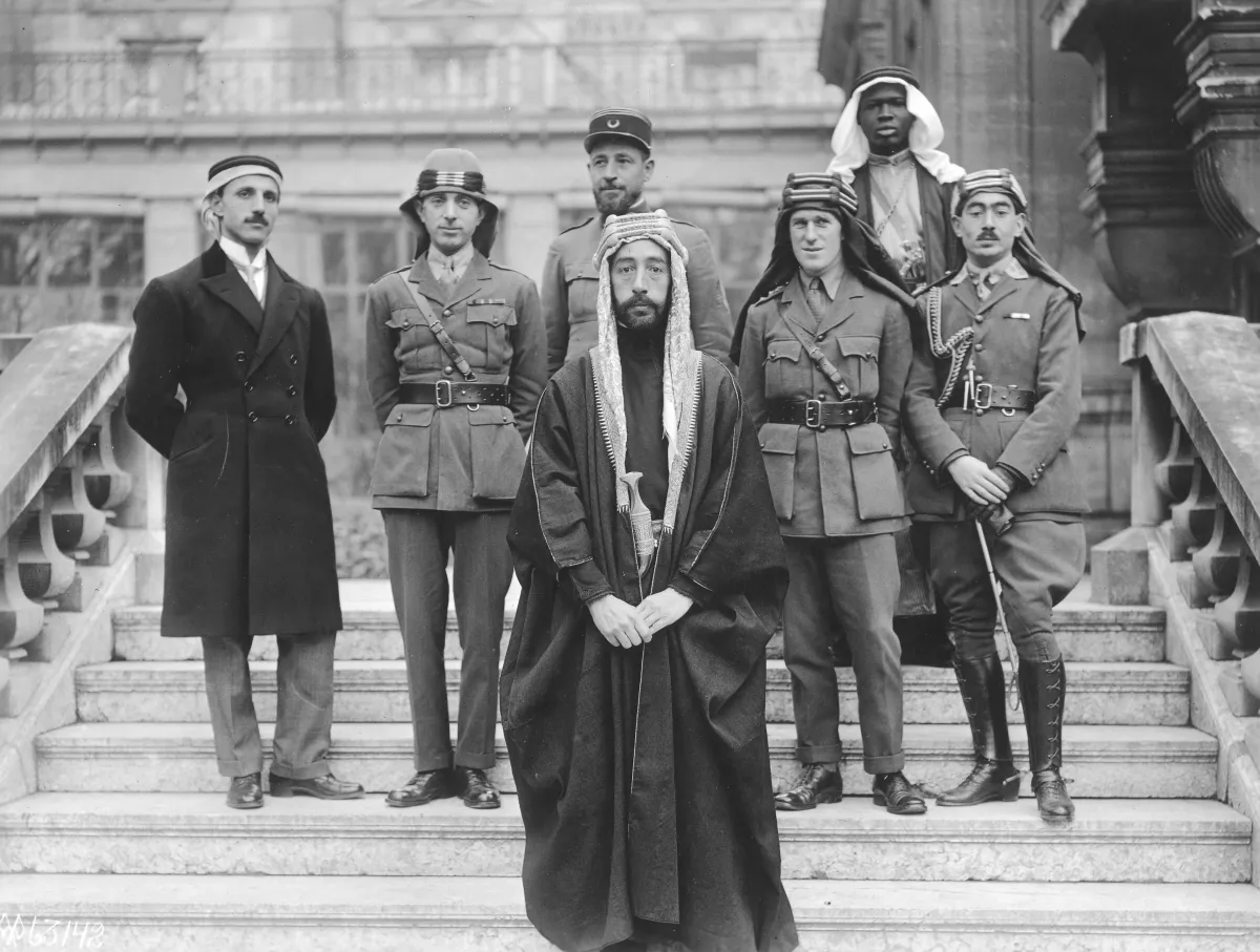 Emir Faisal's delegation at the Paris Peace Conference in 1919, with T. E. Lawrence standing behind him