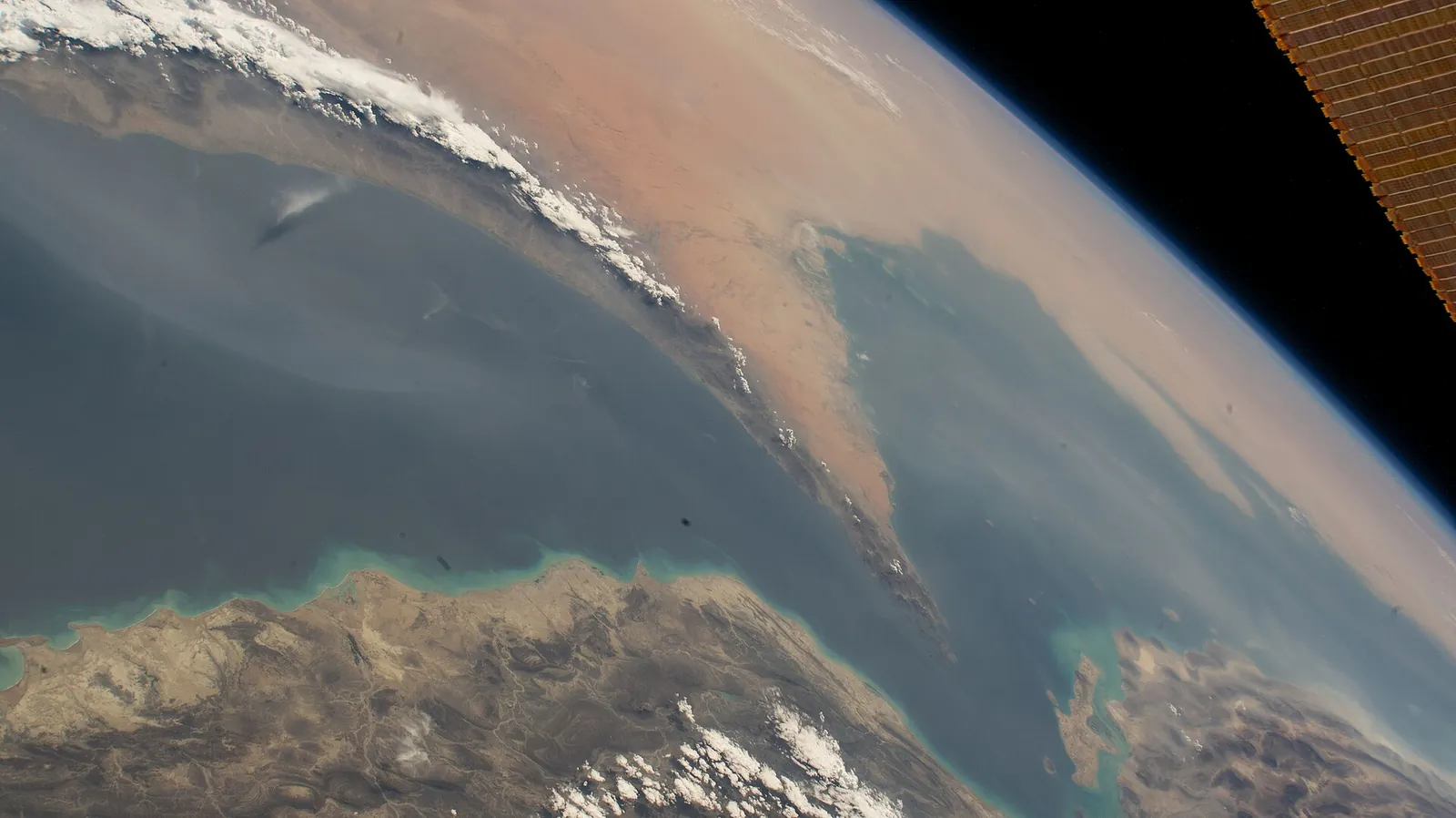 The Strait of Hormuz seen from the International Space Station, with the Iranian coast on one side and the Arabian Peninsula on the other