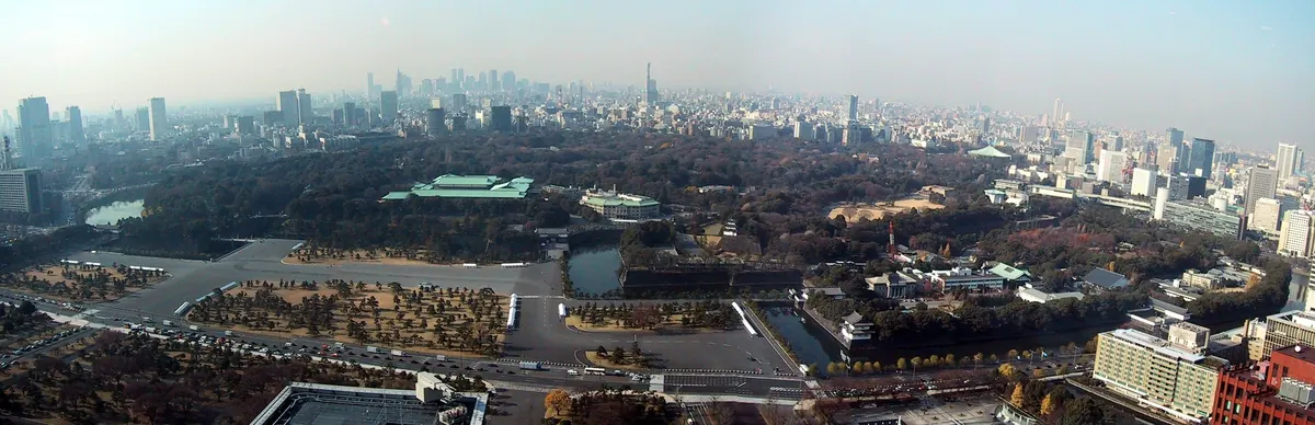 Panoramic view of the Imperial Palace grounds in central Tokyo, surrounded by modern high-rises