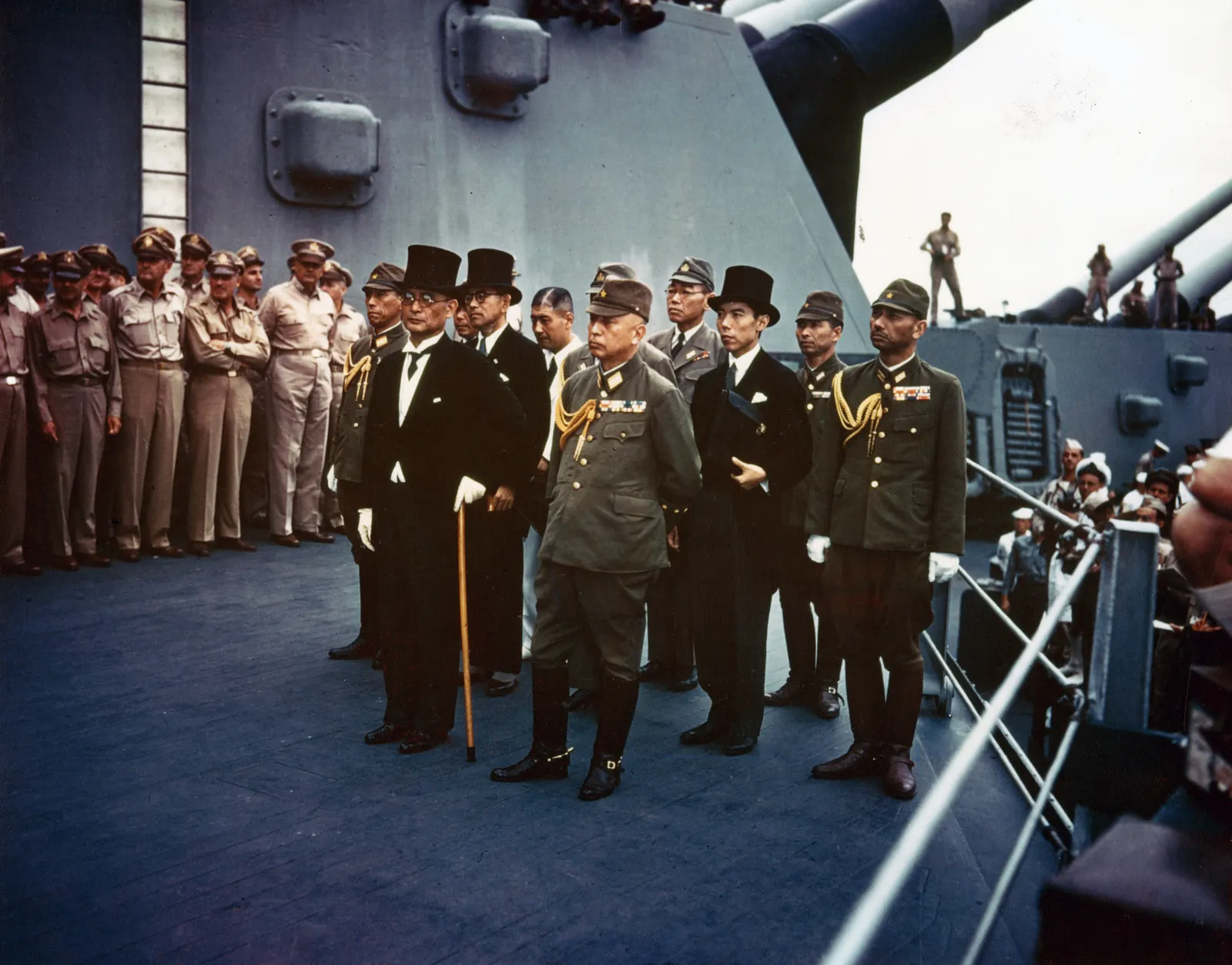 Japanese officials and Allied officers gathered on the deck of the USS Missouri for the surrender ceremony, September 2, 1945