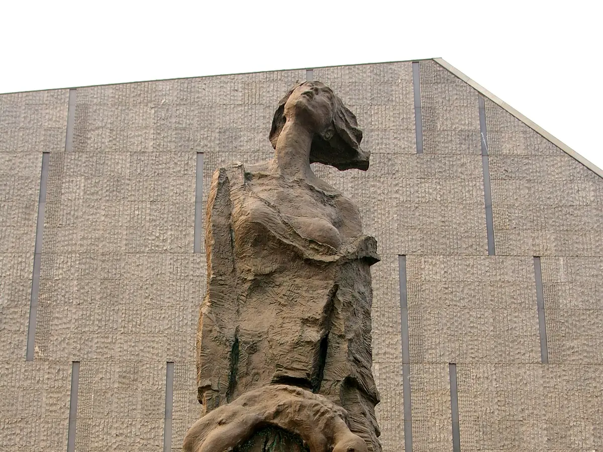 Monument at the entrance to the Nanjing Massacre Memorial Hall, a bronze figure looking upward