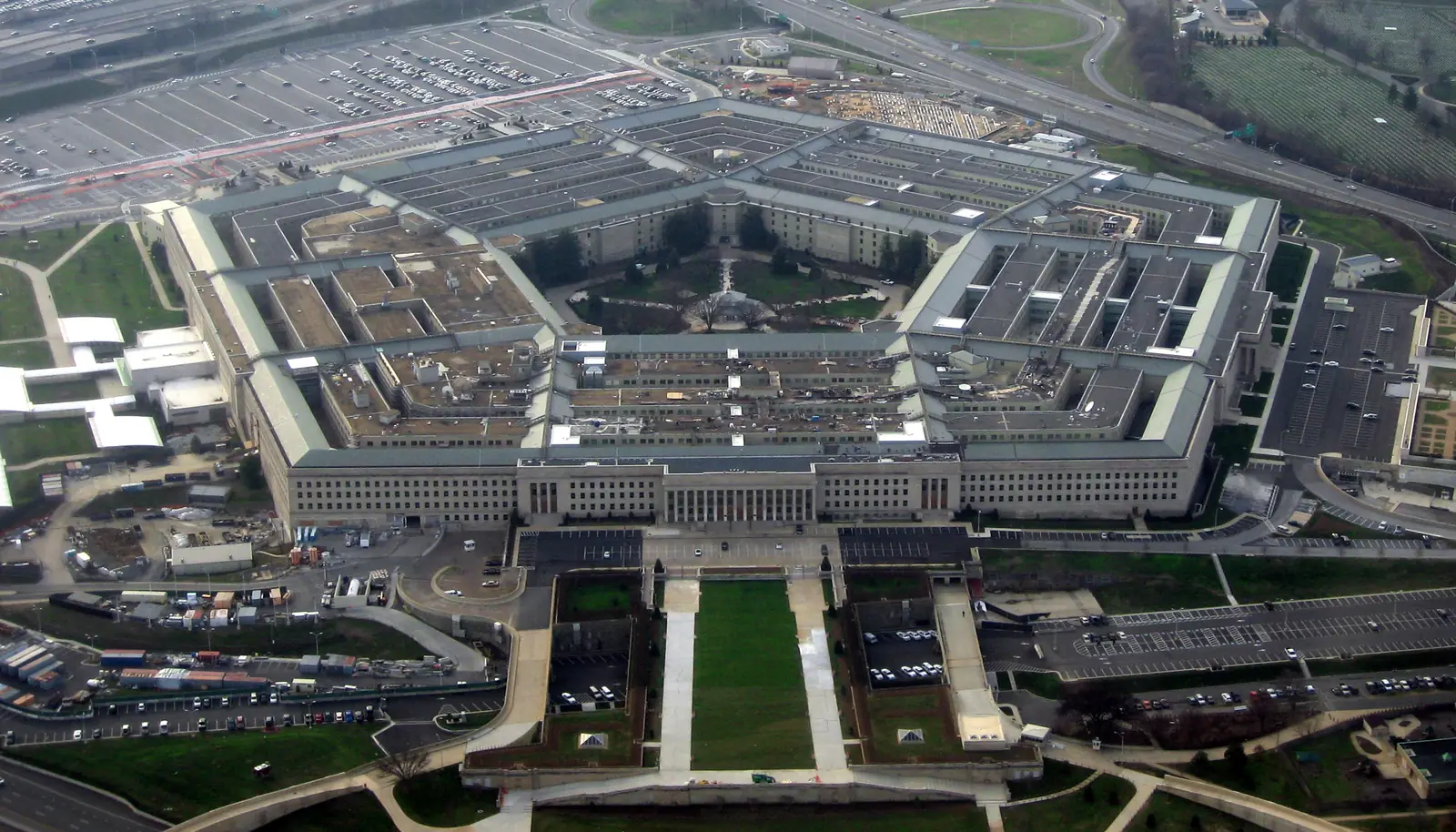 Aerial view of the Pentagon building in Arlington, Virginia, surrounded by highways and parking lots