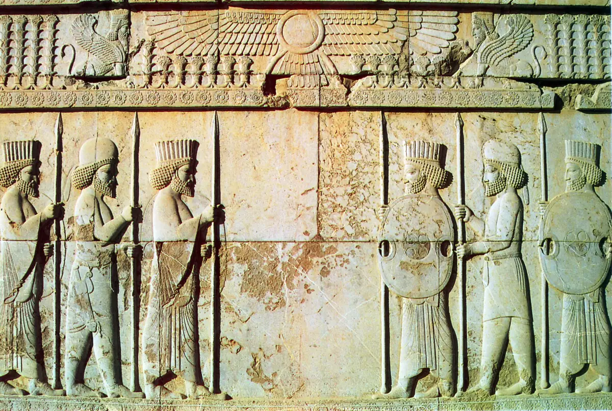 Persian and Median soldiers carved in stone on a stairway at Persepolis