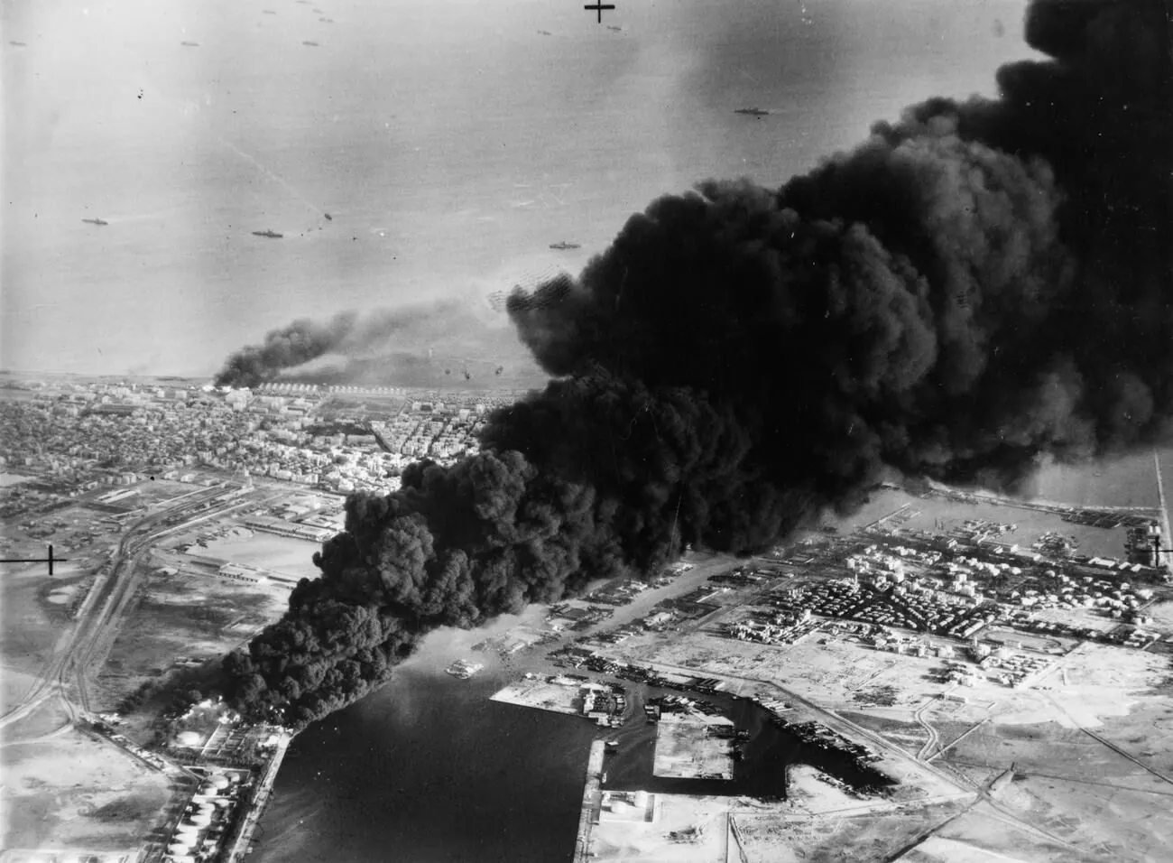 Smoke from burning oil tanks at Port Said during the Anglo-French assault on the Suez Canal