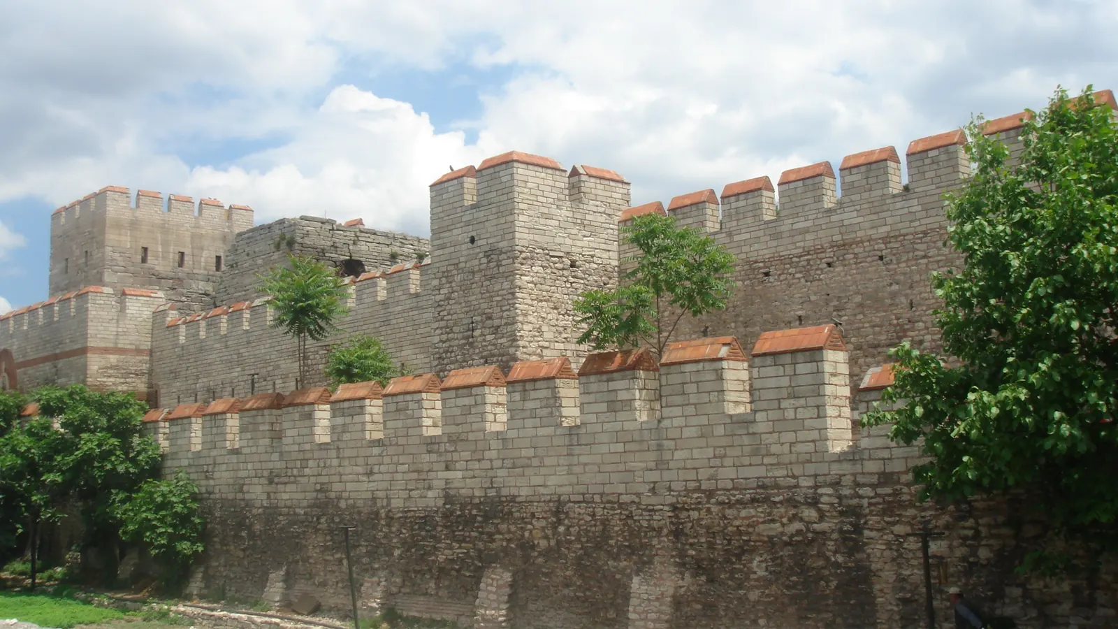 A surviving section of the Theodosian Walls in Istanbul, showing the inner and outer walls with towers still standing