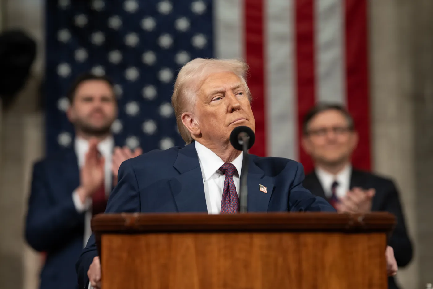 President Trump addressing a joint session of Congress in the House chamber, with Vice President Vance and Speaker Johnson seated behind him