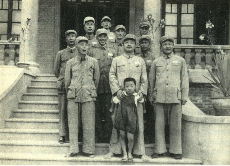 Xi Zhongxun, in military uniform, seated with two other Communist officials in 1949