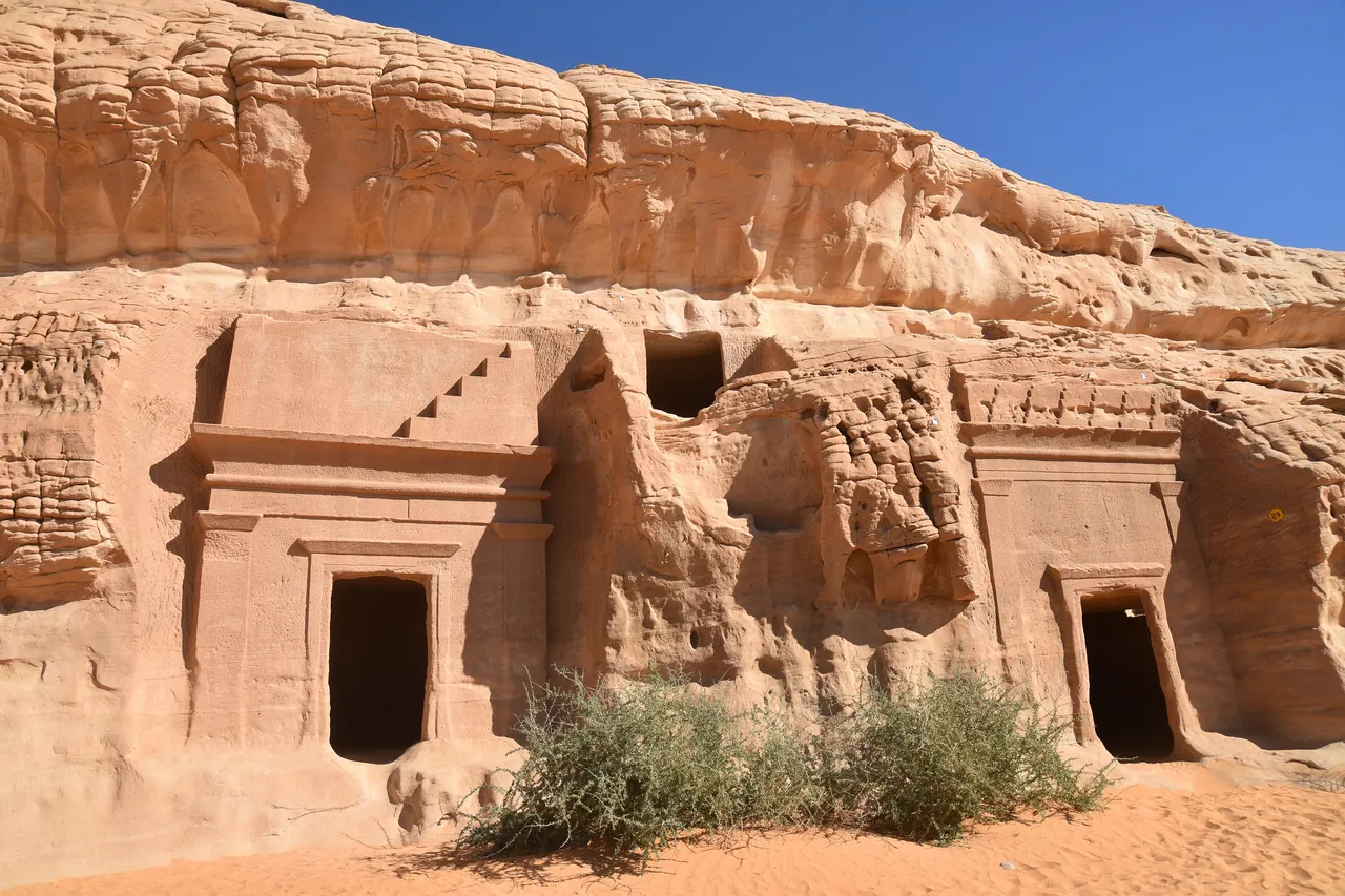Nabataean tombs carved into a sandstone cliff at Hegra, also called Mada'in Salih, in northwestern Saudi Arabia