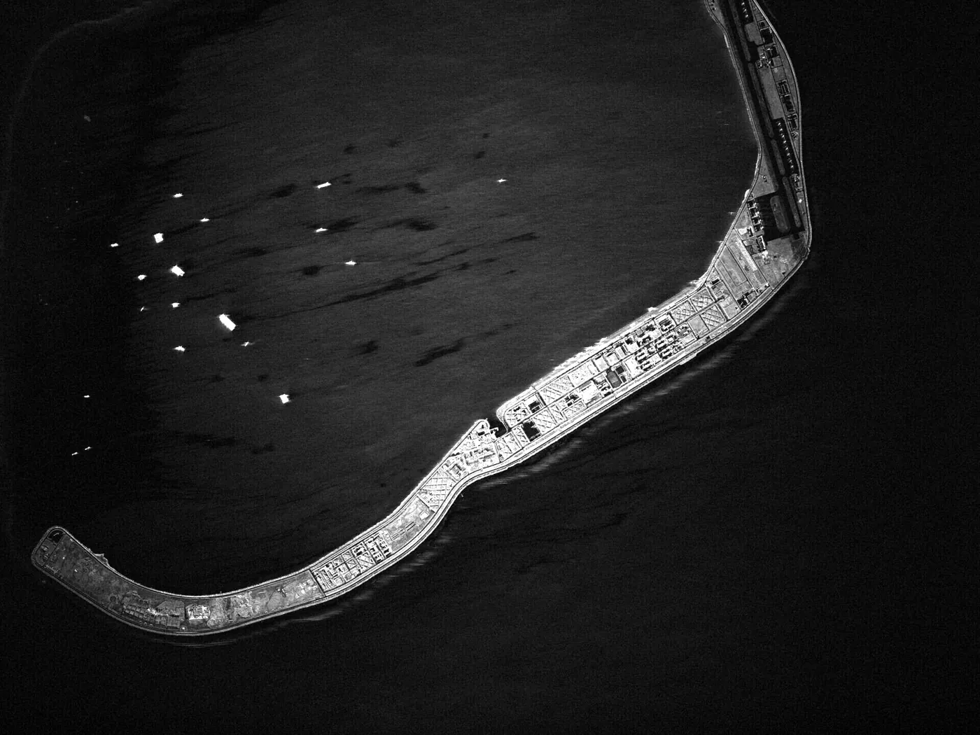 Radar satellite image of Mischief Reef with its runway and ships in the lagoon